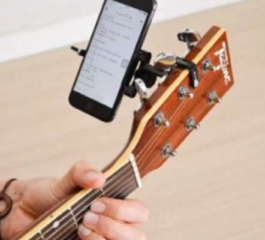 Descoperiți aplicația pentru a cânta la chitară